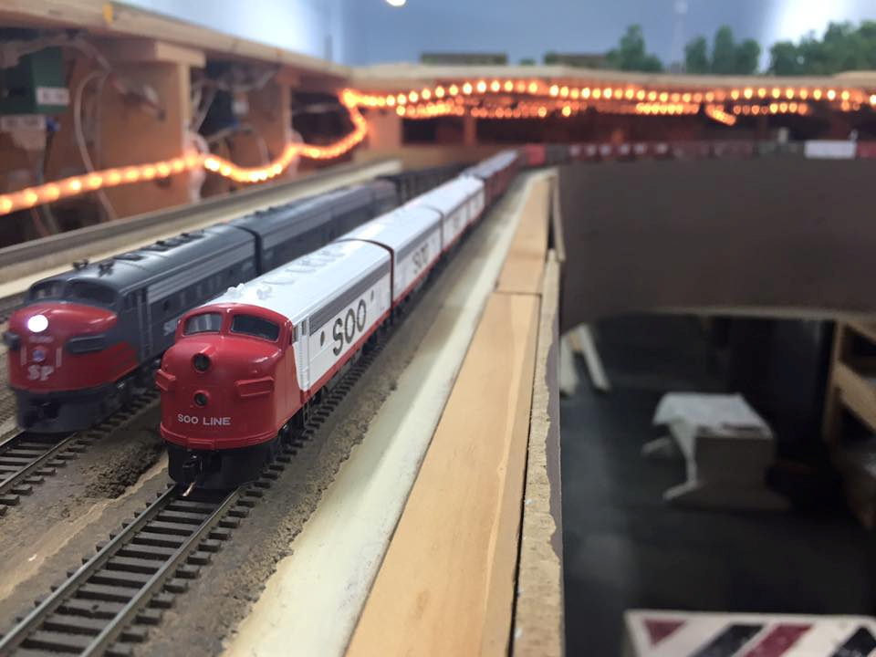 Welcome to the Los Angeles N-Scale Association, operators of East Valley Lines Model Railroad club located since 1979 in the Travel Town Museum at Griffith Los Angeles, California. View pitchers of the East Valley Lines N Scale Model Railroad club and see what they have done to their N scale layout. They operate one of the largest N-Scale layouts in the world. This is just a brief trip on the East Valley Lines' trackage. As you observe closely, there are lots of details to enjoy. This is truly a labor of love, involving countless hours, money and the talents of the many N-Scale modelers dedicated to the memory of great railroads. Brought to you to by www.krafttrains.com