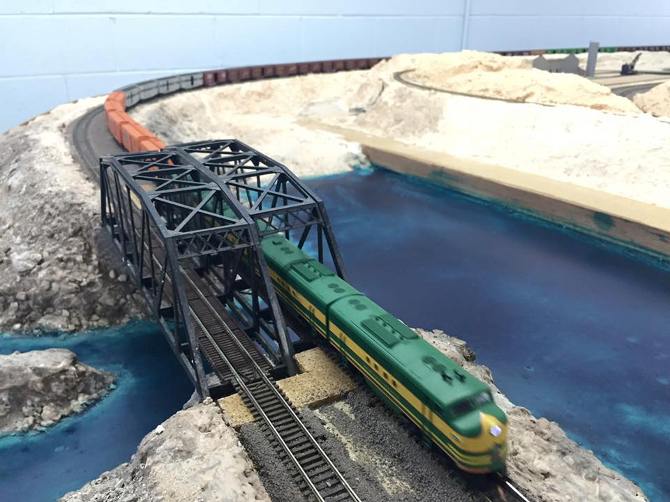 Welcome to the Los Angeles N-Scale Association, operators of East Valley Lines Model Railroad club located since 1979 in the Travel Town Museum at Griffith Los Angeles, California. View pitchers of the East Valley Lines N Scale Model Railroad club and see what they have done to their N scale layout. They operate one of the largest N-Scale layouts in the world. This is just a brief trip on the East Valley Lines' trackage. As you observe closely, there are lots of details to enjoy. This is truly a labor of love, involving countless hours, money and the talents of the many N-Scale modelers dedicated to the memory of great railroads. Brought to you to by www.krafttrains.com