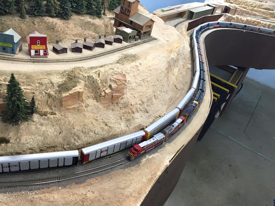 Welcome to the Los Angeles N-Scale Association, operators of East Valley Lines Model Railroad club located since 1979 in the Travel Town Museum at Griffith Los Angeles, California. View pitchers of the East Valley Lines N Scale Model Railroad club and see what they have done to their N scale layout. They operate one of the largest N-Scale layouts in the world. This is just a brief trip on the East Valley Lines' trackage. As you observe closely, there are lots of details to enjoy. This is truly a labor of love, involving countless hours, money and the talents of the many N-Scale modelers dedicated to the memory of great railroads. Brought to you to by www.krafttrains.com