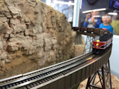 Welcome to the Los Angeles N-Scale Association, operators of East Valley Lines Model Railroad located since 1979 in the Travel Town Museum at Griffith Park. View pitchers of the East Valley Lines N Scale Model Railroad and see what they have done to their N scale layout. They operate one of the largest N-Scale layouts in the world. This is just a brief trip on the East Valley Lines' trackage. As you observe closely, there are lots of details to enjoy. This is truly a labor of love, involving countless hours, money and the talents of the many N-Scale modelers dedicated to the memory of great railroads. Brought to you to by www.krafttrains.com