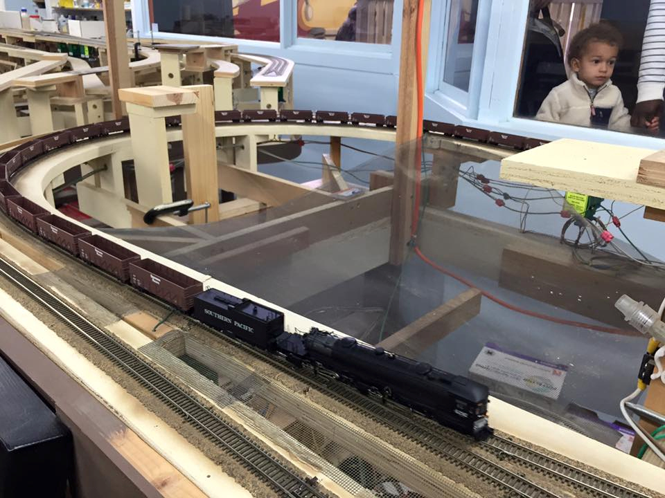 Welcome to the Los Angeles N-Scale Association, operators of East Valley Lines Model Railroad club located since 1979 in the Travel Town Museum at Griffith Los Angeles, California. View pitchers of the East Valley Lines N Scale Model Railroad club and see what they have done to their N scale layout. They operate one of the largest N-Scale layouts in the world. This is just a brief trip on the East Valley Lines' trackage. As you observe closely, there are lots of details to enjoy. This is truly a labor of love, involving countless hours, money and the talents of the many N-Scale modelers dedicated to the memory of great railroads. Brought to you to by www.krafttrains.com
