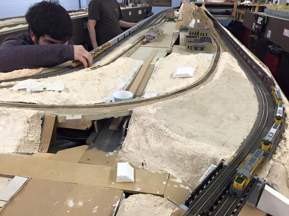 Welcome to the Los Angeles N-Scale Association, operators of East Valley Lines Model Railroad club located since 1979 in the Travel Town Museum at Griffith Los Angeles, California. View pitchers of the East Valley Lines N Scale Model Railroad club and see what they have done to their N scale layout. They operate one of the largest N-Scale layouts in the world. This is just a brief trip on the East Valley Lines' trackage. As you observe closely, there are lots of details to enjoy. This is truly a labor of love, involving countless hours, money and the talents of the many N-Scale modelers dedicated to the memory of great railroads. Brought to you to by www.krafttrains.com