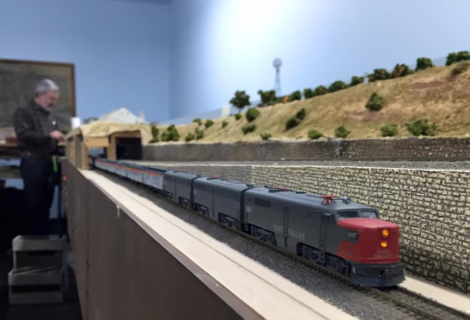 Welcome to the Los Angeles N-Scale Association, operators of East Valley Lines Model Railroad club located since 1979 in the Travel Town Museum at Griffith Los Angeles, California. View pitchers of the East Valley Lines N Scale Model Railroad club and see what they have done to their N scale layout. They operate one of the largest N-Scale layouts in the world. This is just a brief trip on the East Valley Lines' trackage. As you observe closely, there are lots of details to enjoy. This is truly a labor of love, involving countless hours, money and the talents of the many N-Scale modelers dedicated to the memory of great railroads. Brought to you to by www.krafttrains.com