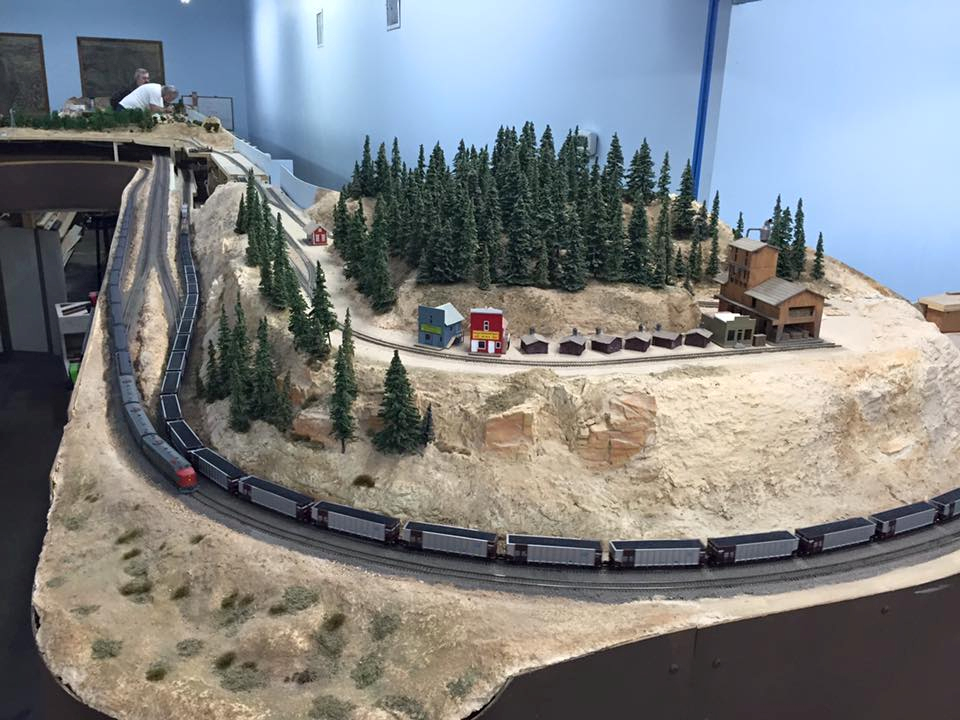 Welcome to the Los Angeles N-Scale Association, operators of East Valley Lines Model Railroad club located since 1979 in the Travel Town Museum at Griffith Los Angeles, California. View pitchers of the East Valley Lines N Scale Model Railroad club and see what they have done to their N scale layout. They operate one of the largest N-Scale layouts in the world. This is just a brief trip on the East Valley Lines' trackage. As you observe closely, there are lots of details to enjoy. This is truly a labor of love, involving countless hours, money and the talents of the many N-Scale modelers dedicated to the memory of great railroads. Brought to you to by www.krafttrains.com