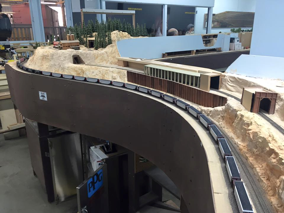 Welcome to the Los Angeles N-Scale Association, operators of East Valley Lines Model Railroad club located since 1979 in the Travel Town Museum at Griffith Los Angeles, California. View pitchers of the East Valley Lines N Scale Model Railroad club and see what they have done to their N scale layout. They operate one of the largest N-Scale layouts in the world. This is just a brief trip on the East Valley Lines' trackage. As you observe closely, there are lots of details to enjoy. This is truly a labor of love, involving countless hours, money and the talents of the many N-Scale modelers dedicated to the memory of great railroads. Brought to you to by www.krafttrains.com