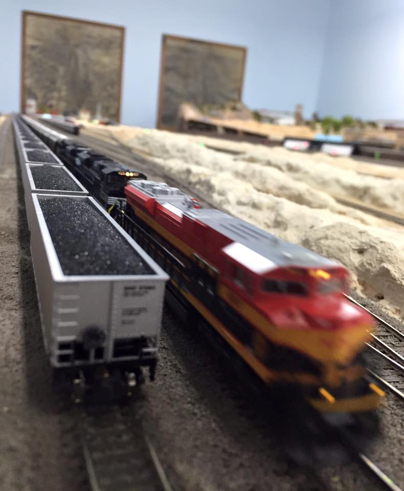 Welcome to the Los Angeles N-Scale Association, operators of East Valley Lines Model Railroad club located since 1979 in the Travel Town Museum at Griffith Los Angeles, California. View pitchers of the East Valley Lines N Scale Model Railroad club and see what they have done to their N scale layout. They operate one of the largest N-Scale layouts in the world. This is just a brief trip on the East Valley Lines' trackage. As you observe closely, there are lots of details to enjoy. This is truly a labor of love, involving countless hours, money and the talents of the many N-Scale modelers dedicated to the memory of great railroads. Brought to you to by www.krafttrains.com