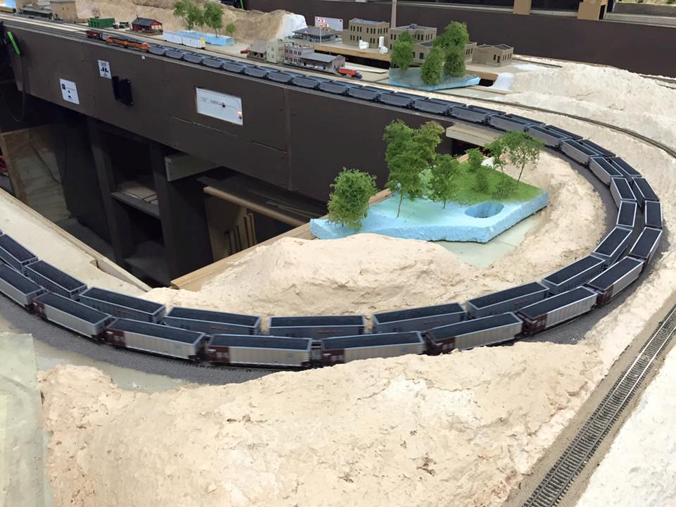 Welcome to the Los Angeles N-Scale Association, operators of East Valley Lines Model Railroad club located since 1979 in the Travel Town Museum at Griffith Los Angeles, California. View pitchers of the East Valley Lines N Scale Model Railroad club and see what they have done to their N scale layout. They operate one of the largest N-Scale layouts in the world. This is just a brief trip on the East Valley Lines' trackage. As you observe closely, there are lots of details to enjoy. This is truly a labor of love, involving countless hours, money and the talents of the many N-Scale modelers dedicated to the memory of great railroads. Brought to you to by www.krafttrains.com