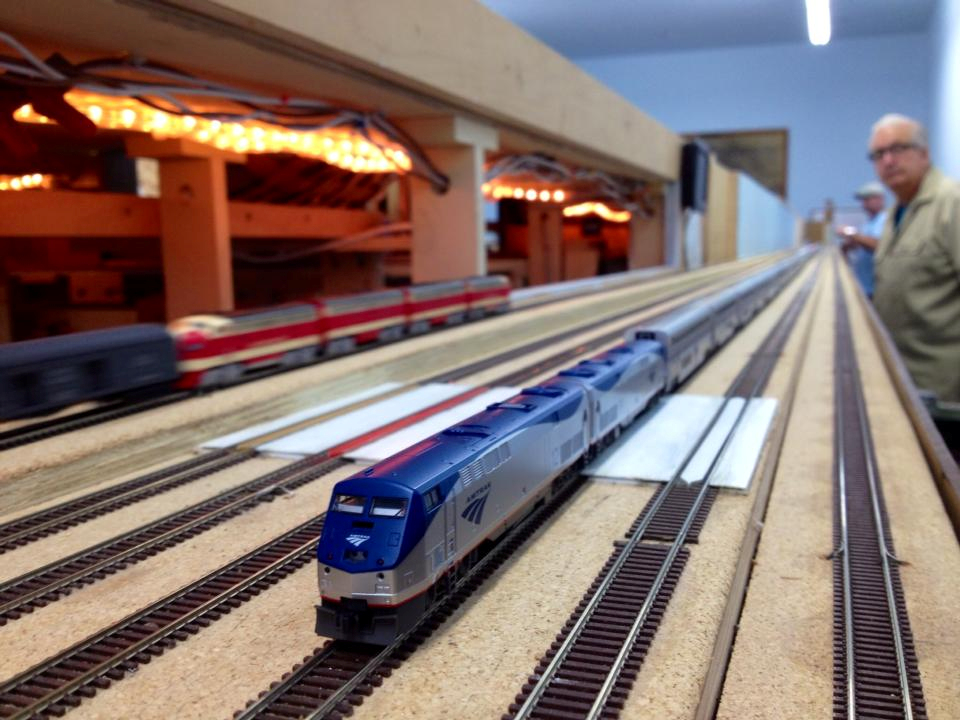 Welcome to the Los Angeles N-Scale Association, operators of East Valley Lines Model Railroad club located since 1979 in the Travel Town Museum at Griffith Los Angeles, California. View pitchers of the East Valley Lines N Scale Model Railroad club and see what they have done to their N scale layout. They operate one of the largest N-Scale layouts in the world. This is just a brief trip on the East Valley Lines' trackage. As you observe closely, there are lots of details to enjoy. This is truly a labor of love, involving countless hours, money and the talents of the many N-Scale modelers dedicated to the memory of great railroads. Brought to you to by www.krafttrains.com