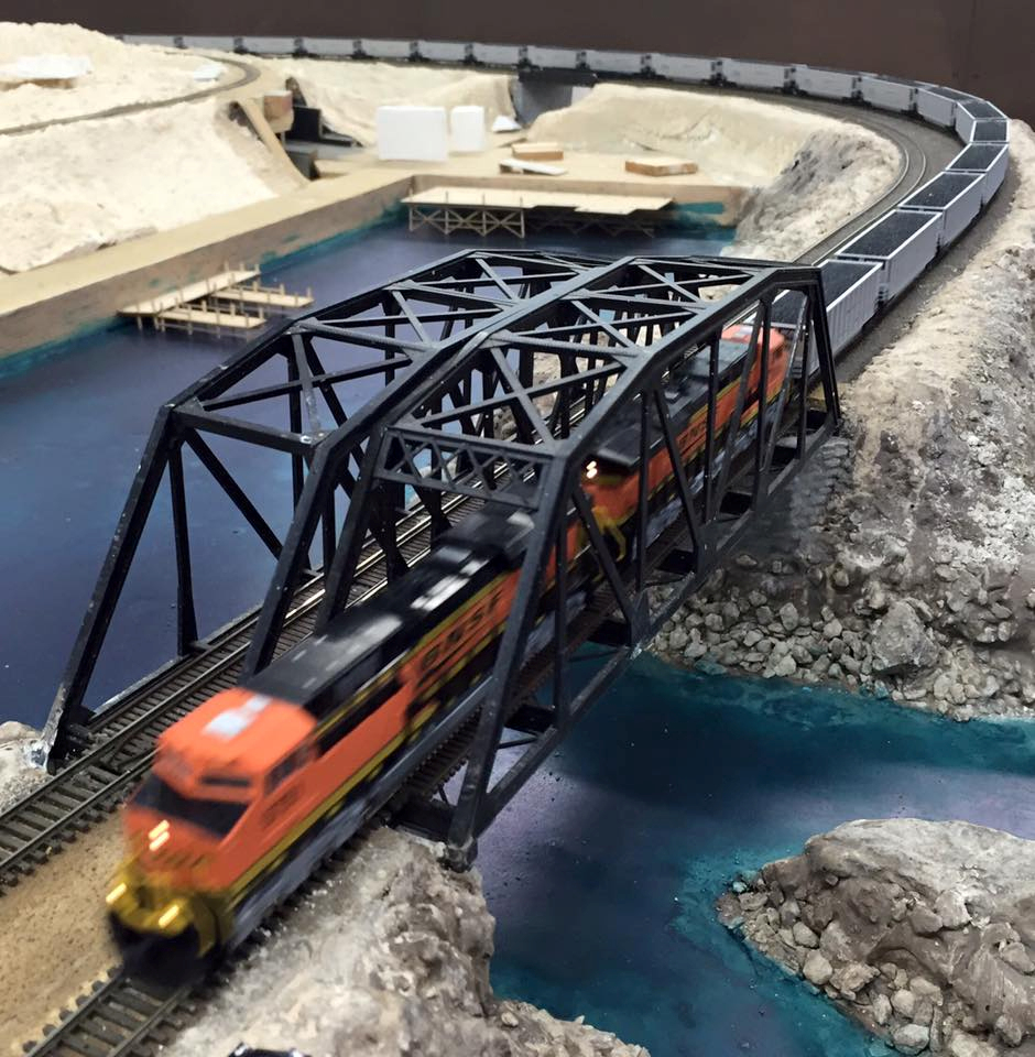 Welcome to the Los Angeles N-Scale Association, operators of East Valley Lines Model Railroad club located since 1979 in the Travel Town Museum at Griffith Los Angeles, California. View pitchers of the East Valley Lines N Scale Model Railroad club and see what they have done to their N scale layout. They operate one of the largest N-Scale layouts in the world. This is just a brief trip on the East Valley Lines' trackage. As you observe closely, there are lots of details to enjoy. This is truly a labor of love, involving countless hours, money and the talents of the many N-Scale modelers dedicated to the memory of great railroads. Brought to you to by www.krafttrains.com