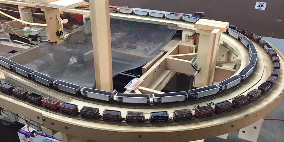 Welcome to the Los Angeles N-Scale Association, operators of East Valley Lines Model Railroad club located since 1979 in the Travel Town Museum at Griffith Los Angeles, California. View pitchers of the East Valley Lines N Scale Model Railroad club and see what they have done to their N scale layout. They operate one of the largest N-Scale layouts in the world. This is just a brief trip on the East Valley Lines' trackage. As you observe closely, there are lots of details to enjoy. This is truly a labor of love, involving countless hours, money and the talents of the many N-Scale modelers dedicated to the memory of great railroads. Brought to you to by www.krafttrains.com