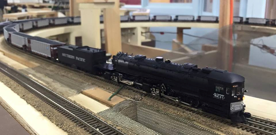 Welcome to the Los Angeles N-Scale Association, operators of East Valley Lines Model Railroad club located since 1979 in the Travel Town Museum at Griffith Los Angeles, California. View pitchers of the East Valley Lines N Scale Model Railroad club and see what they have done to their N scale layout. They operate one of the largest N-Scale layouts in the world. This is just a brief trip on the East Valley Lines' trackage. As you observe closely, there are lots of details to enjoy. This is truly a labor of love, involving countless hours, money and the talents of the many N-Scale modelers dedicated to the memory of great railroads. Brought to you to by www.krafttrains.com