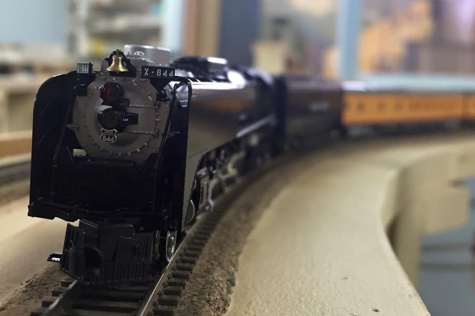 Welcome to the Los Angeles N-Scale Association, operators of East Valley Lines Model Railroad club located since 1979 in the Travel Town Museum at Griffith Los Angeles, California. View pitchers of the East Valley Lines N Scale Model Railroad club and see what they have done to their N scale layout. They operate one of the largest N-Scale layouts in the world. This is just a brief trip on the East Valley Lines' trackage. As you observe closely, there are lots of details to enjoy. This is truly a labor of love, involving countless hours, money and the talents of the many N-Scale modelers dedicated to the memory of great railroads. Brought to you to by www.krafttrains.com