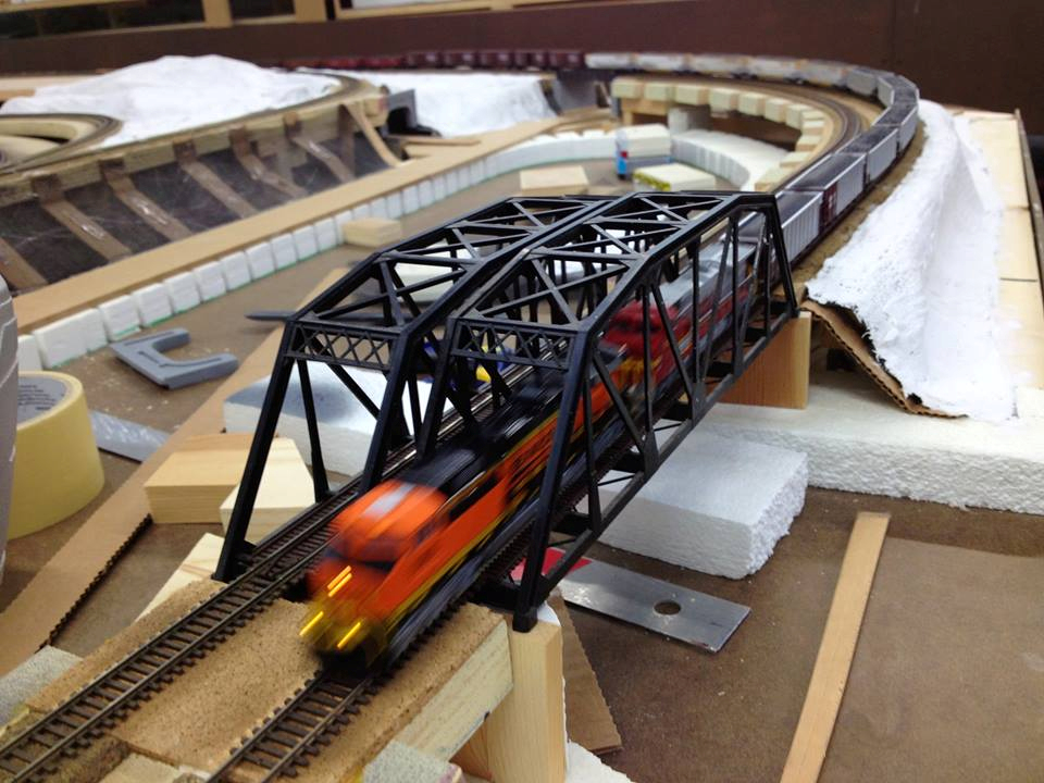 Welcome to the Los Angeles N-Scale Association, operators of East Valley Lines Model Railroad club located since 1979 in the Travel Town Museum at Griffith Los Angeles, California. View pitchers of the East Valley Lines N Scale Model Railroad club and see what they have done to their N scale layout. They operate one of the largest N-Scale layouts in the world. This is just a brief trip on the East Valley Lines' trackage. As you observe closely, there are lots of details to enjoy. This is truly a labor of love, involving countless hours, money and the talents of the many N-Scale modelers dedicated to the memory of great railroads. Brought to you to by www.krafttrains.com