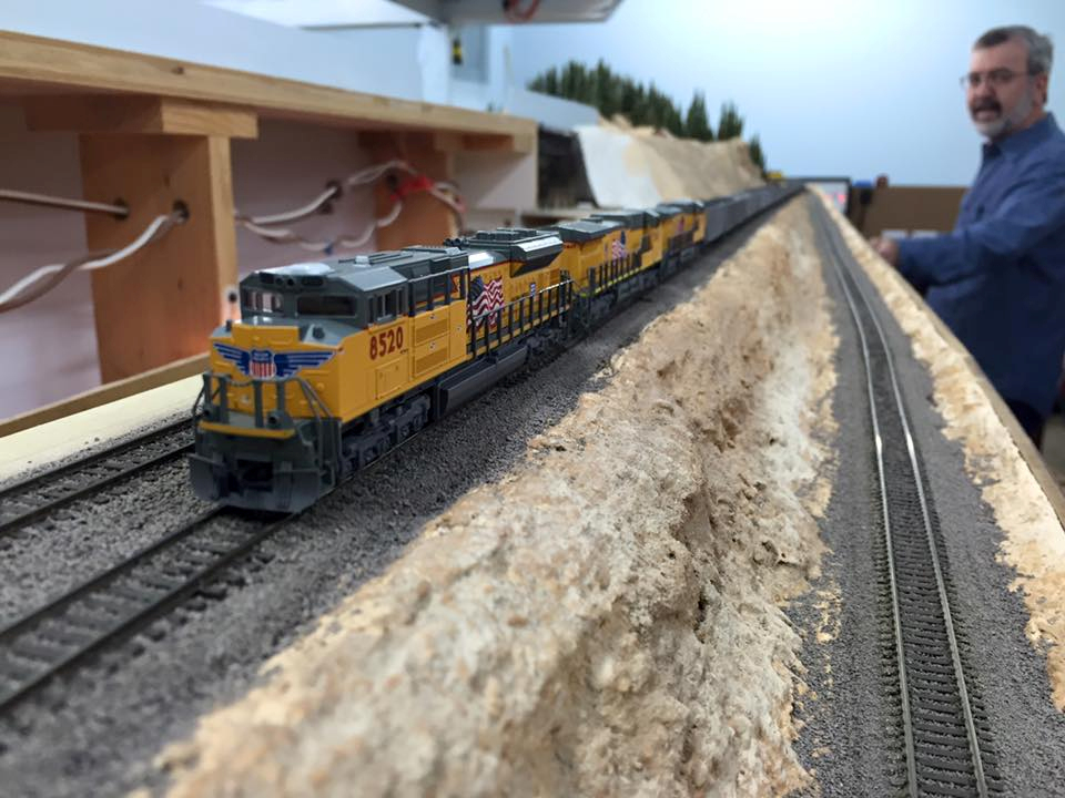Welcome to the Los Angeles N-Scale Association, operators of East Valley Lines Model Railroad club located since 1979 in the Travel Town Museum at Griffith Los Angeles, California. View pitchers of the East Valley Lines N Scale Model Railroad club and see what they have done to their N scale layout. They operate one of the largest N-Scale layouts in the world. This is just a brief trip on the East Valley Lines' trackage. As you observe closely, there are lots of details to enjoy. This is truly a labor of love, involving countless hours, money and the talents of the many N-Scale modelers dedicated to the memory of great railroads. Brought to you to by www.krafttrains.com