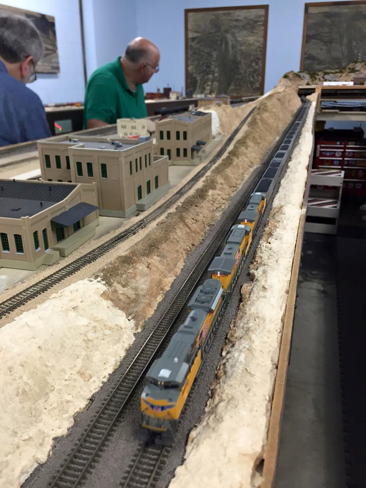 Welcome to the Los Angeles N-Scale Association, operators of East Valley Lines Model Railroad club located since 1979 in the Travel Town Museum at Griffith Los Angeles, California. View pitchers of the East Valley Lines N Scale Model Railroad club and see what they have done to their N scale layout. They operate one of the largest N-Scale layouts in the world. This is just a brief trip on the East Valley Lines' trackage. As you observe closely, there are lots of details to enjoy. This is truly a labor of love, involving countless hours, money and the talents of the many N-Scale modelers dedicated to the memory of great railroads. Brought to you to by www.krafttrains.com