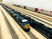 Welcome to the Los Angeles N-Scale Association, operators of East Valley Lines Model Railroad located since 1979 in the Travel Town Museum at Griffith Park. View pitchers of the East Valley Lines N Scale Model Railroad and see what they have done to their N scale layout. They operate one of the largest N-Scale layouts in the world. This is just a brief trip on the East Valley Lines' trackage. As you observe closely, there are lots of details to enjoy. This is truly a labor of love, involving countless hours, money and the talents of the many N-Scale modelers dedicated to the memory of great railroads. Brought to you to by www.krafttrains.com