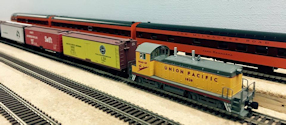 Welcome to the Los Angeles N-Scale Association, operators of East Valley Lines Model Railroad located since 1979 in the Travel Town Museum at Griffith Park. View pitchers of the East Valley Lines N Scale Model Railroad and see what they have done to their N scale layout. They operate one of the largest N-Scale layouts in the world. This is just a brief trip on the East Valley Lines' trackage. As you observe closely, there are lots of details to enjoy. This is truly a labor of love, involving countless hours, money and the talents of the many N-Scale modelers dedicated to the memory of great railroads. Brought to you to by www.krafttrains.com