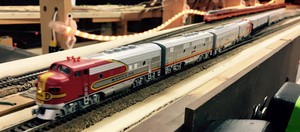 Welcome to the Los Angeles N-Scale Association, operators of East Valley Lines Model Railroad club located since 1979 in the Travel Town Museum at Griffith Los Angeles, California. View pitchers of the East Valley Lines N Scale Model Railroad club and see what they have done to their N scale layout. They operate one of the largest N-Scale layouts in the world. This is just a brief trip on the East Valley Lines' trackage. As you observe closely, there are lots of details to enjoy. This is truly a labor of love, involving countless hours, money and the talents of the many N-Scale modelers dedicated to the memory of great railroads. Brought to you to by www.krafttrains.com