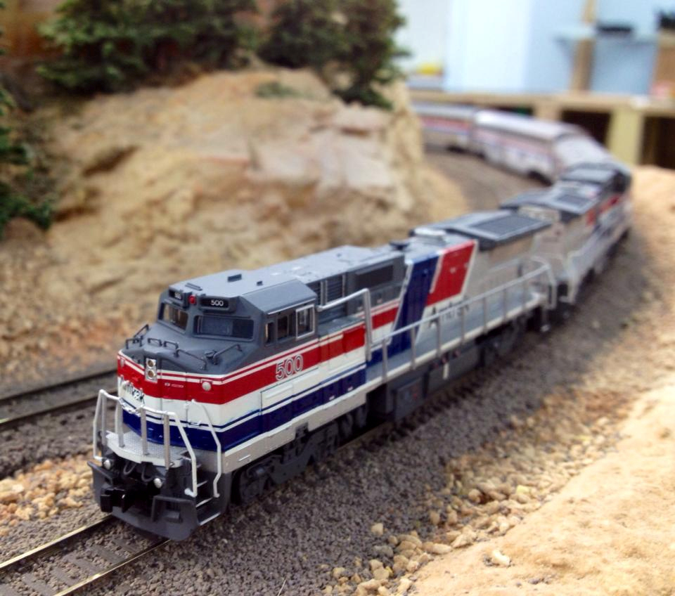 Welcome to the Los Angeles N-Scale Association, operators of East Valley Lines Model Railroad club located since 1979 in the Travel Town Museum at Griffith Los Angeles, California. View pitchers of the East Valley Lines N Scale Model Railroad club and see what they have done to their N scale layout. They operate one of the largest N-Scale layouts in the world. This is just a brief trip on the East Valley Lines' trackage. As you observe closely, there are lots of details to enjoy. This is truly a labor of love, involving countless hours, money and the talents of the many N-Scale modelers dedicated to the memory of great railroads. Brought to you to by www.krafttrains.com