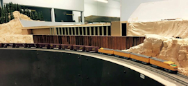 Welcome to the Los Angeles N-Scale Association, operators of East Valley Lines Model Railroad located since 1979 in the Travel Town Museum at Griffith Park. View pitchers of the East Valley Lines N Scale Model Railroad and see what they have done to their N scale layout. They operate one of the largest N-Scale layouts in the world. This is just a brief trip on the East Valley Lines' trackage. As you observe closely, there are lots of details to enjoy. This is truly a labor of love, involving countless hours, money and the talents of the many N-Scale modelers dedicated to the memory of great railroads. Brought to you to by www.krafttrains.com