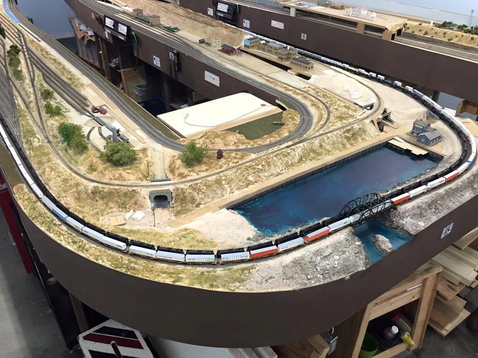 Welcome to the Los Angeles N-Scale Association, operators of East Valley Lines Model Railroad club located since 1979 in the Travel Town Museum at Griffith Los Angeles, California. View pitchers of the East Valley Lines N Scale Model Railroad club and see what they have done to their N scale layout. They operate one of the largest N-Scale layouts in the world. This is just a brief trip on the East Valley Lines' trackage. As you observe closely, there are lots of details to enjoy. This is truly a labor of love, involving countless hours, money and the talents of the many N-Scale modelers dedicated to the memory of great railroads. Brought to you to by www.krafttrains.com