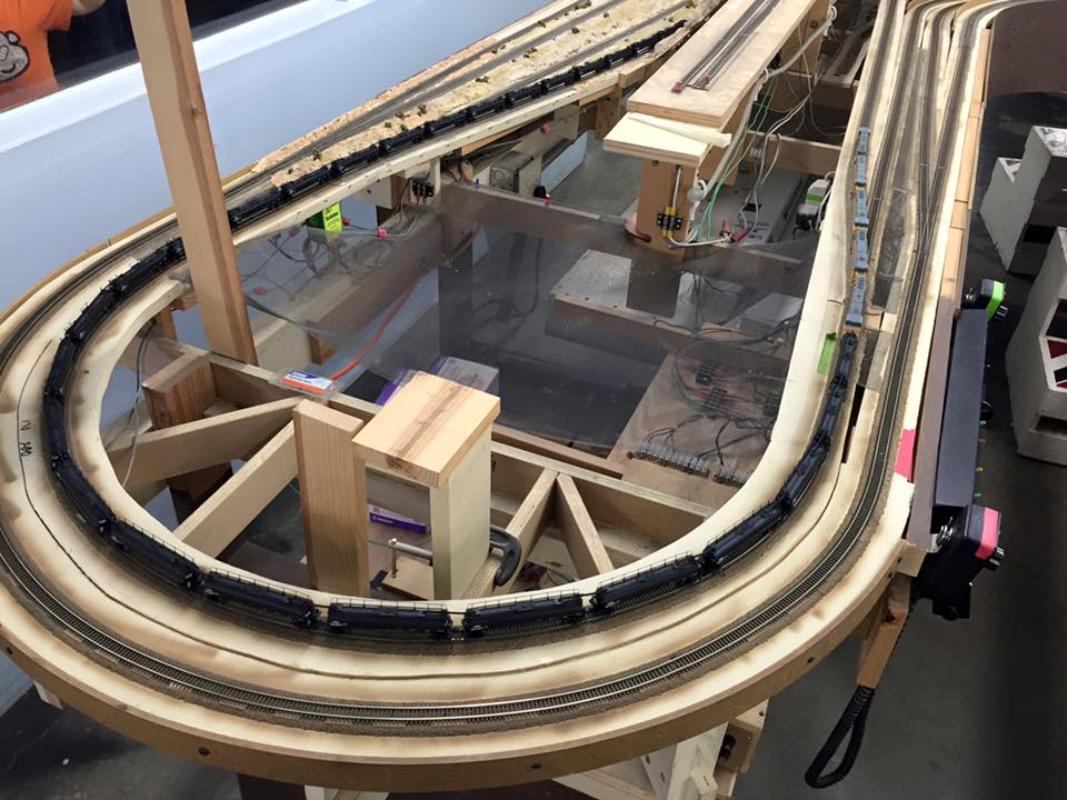 Welcome to the Los Angeles N-Scale Association, operators of East Valley Lines Model Railroad club located since 1979 in the Travel Town Museum at Griffith Los Angeles, California. View pitchers of the East Valley Lines N Scale Model Railroad club and see what they have done to their N scale layout. They operate one of the largest N-Scale layouts in the world. This is just a brief trip on the East Valley Lines' trackage. As you observe closely, there are lots of details to enjoy. This is truly a labor of love, involving countless hours, money and the talents of the many N-Scale modelers dedicated to the memory of great railroads. Brought to you to by www.krafttrains.com