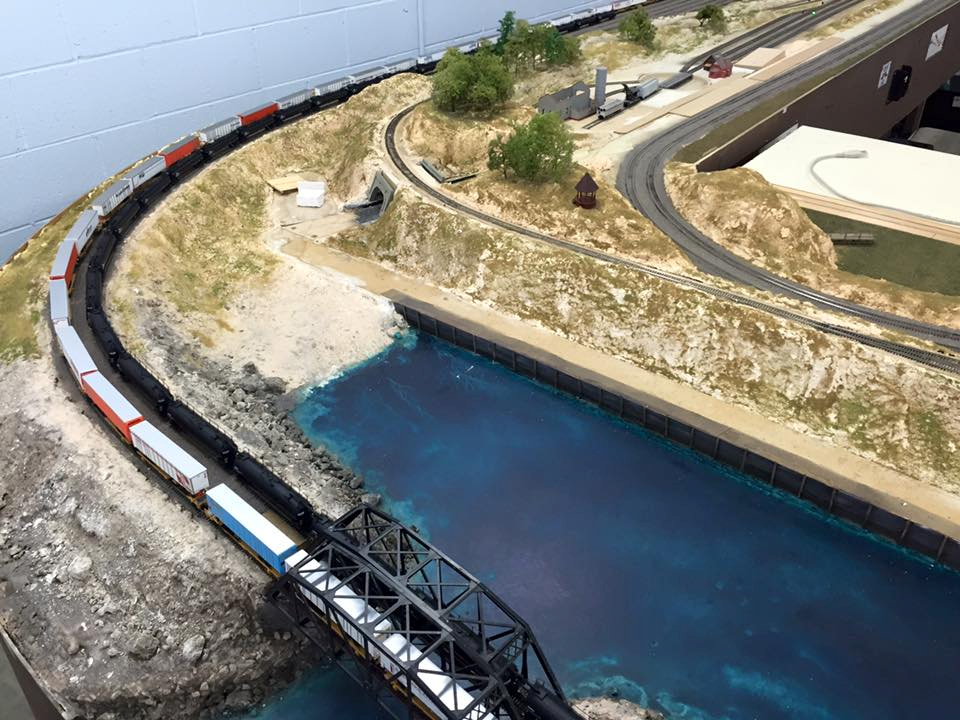 Welcome to the Los Angeles N-Scale Association, operators of East Valley Lines Model Railroad club located since 1979 in the Travel Town Museum at Griffith Los Angeles, California. View pitchers of the East Valley Lines N Scale Model Railroad club and see what they have done to their N scale layout. They operate one of the largest N-Scale layouts in the world. This is just a brief trip on the East Valley Lines' trackage. As you observe closely, there are lots of details to enjoy. This is truly a labor of love, involving countless hours, money and the talents of the many N-Scale modelers dedicated to the memory of great railroads. Brought to you to by www.krafttrains.com