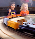 Welcome to the Los Angeles N-Scale Association, operators of East Valley Lines Model Railroad located since 1979 in the Travel Town Museum at Griffith Park. View pitchers of the East Valley Lines N Scale Model Railroad and see what they have done to their N scale layout. They operate one of the largest N-Scale layouts in the world. This is just a brief trip on the East Valley Lines' trackage. As you observe closely, there are lots of details to enjoy. This is truly a labor of love, involving countless hours, money and the talents of the many N-Scale modelers dedicated to the memory of great railroads. Brought to you to by www.krafttrains.com
