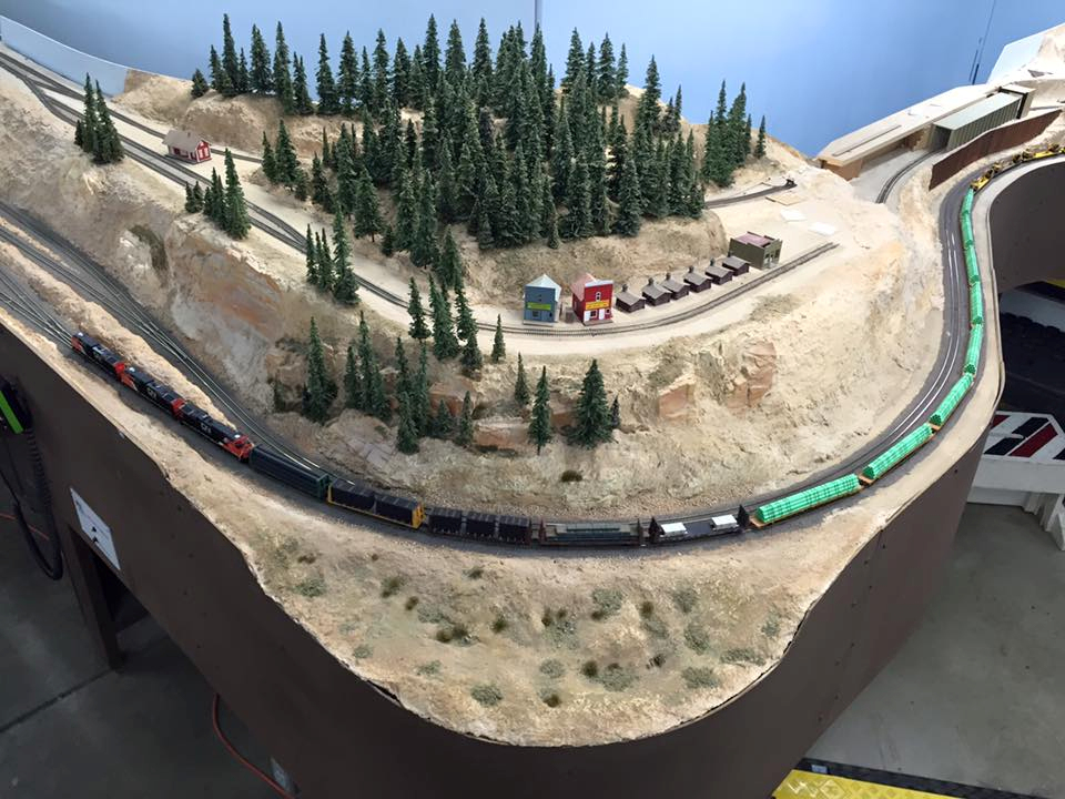 Welcome to the Los Angeles N-Scale Association, operators of East Valley Lines Model Railroad club located since 1979 in the Travel Town Museum at Griffith Los Angeles, California. View pitchers of the East Valley Lines N Scale Model Railroad club and see what they have done to their N scale layout. They operate one of the largest N-Scale layouts in the world. This is just a brief trip on the East Valley Lines' trackage. As you observe closely, there are lots of details to enjoy. This is truly a labor of love, involving countless hours, money and the talents of the many N-Scale modelers dedicated to the memory of great railroads. Brought to you to by www.krafttrains.com