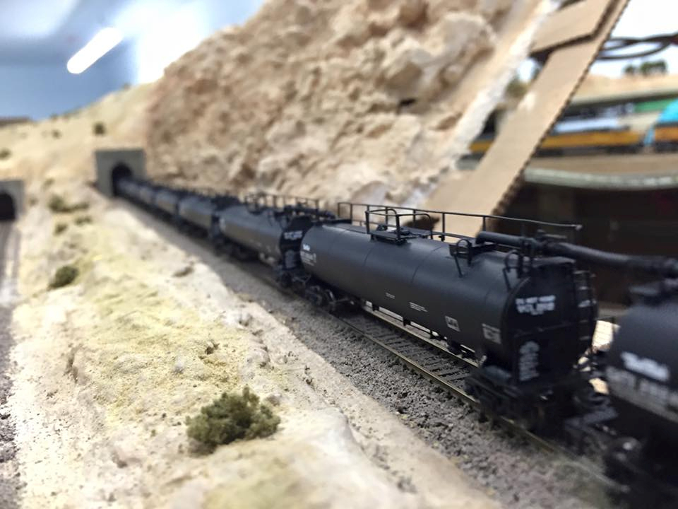 Welcome to the Los Angeles N-Scale Association, operators of East Valley Lines Model Railroad club located since 1979 in the Travel Town Museum at Griffith Los Angeles, California. View pitchers of the East Valley Lines N Scale Model Railroad club and see what they have done to their N scale layout. They operate one of the largest N-Scale layouts in the world. This is just a brief trip on the East Valley Lines' trackage. As you observe closely, there are lots of details to enjoy. This is truly a labor of love, involving countless hours, money and the talents of the many N-Scale modelers dedicated to the memory of great railroads. Brought to you to by www.krafttrains.com