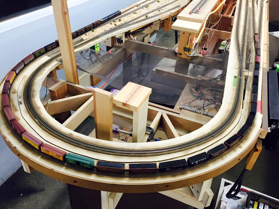 Welcome to the Los Angeles N-Scale Association, operators of East Valley Lines Model Railroad club located since 1979 in the Travel Town Museum at Griffith Los Angeles, California. View pitchers of the East Valley Lines N Scale Model Railroad club and see what they have done to their N scale layout. They operate one of the largest N-Scale layouts in the world. This is just a brief trip on the East Valley Lines' trackage. As you observe closely, there are lots of details to enjoy. This is truly a labor of love, involving countless hours, money and the talents of the many N-Scale modelers dedicated to the memory of great railroads. Brought to you to by www.krafttrains.com