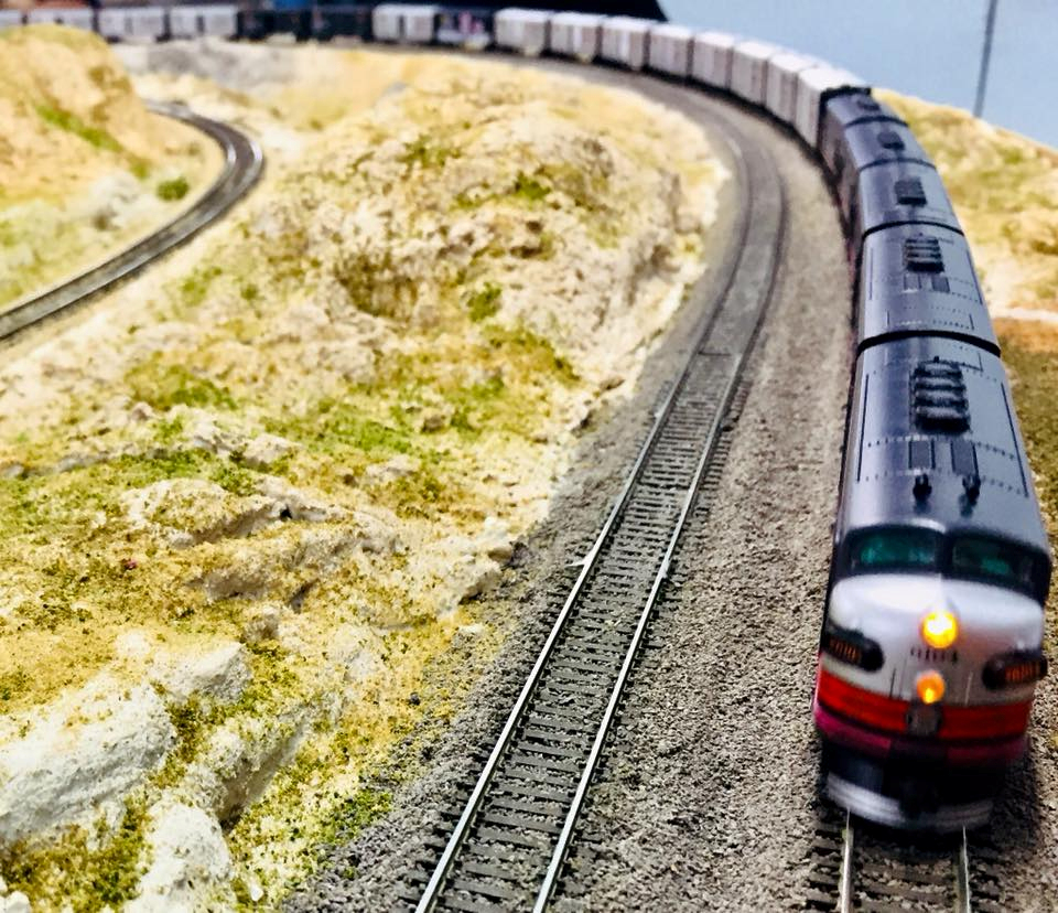 Welcome to the Los Angeles N-Scale Association, operators of East Valley Lines Model Railroad club located since 1979 in the Travel Town Museum at Griffith Los Angeles, California. View pitchers of the East Valley Lines N Scale Model Railroad club and see what they have done to their N scale layout. They operate one of the largest N-Scale layouts in the world. This is just a brief trip on the East Valley Lines' trackage. As you observe closely, there are lots of details to enjoy. This is truly a labor of love, involving countless hours, money and the talents of the many N-Scale modelers dedicated to the memory of great railroads. Brought to you to by www.krafttrains.com