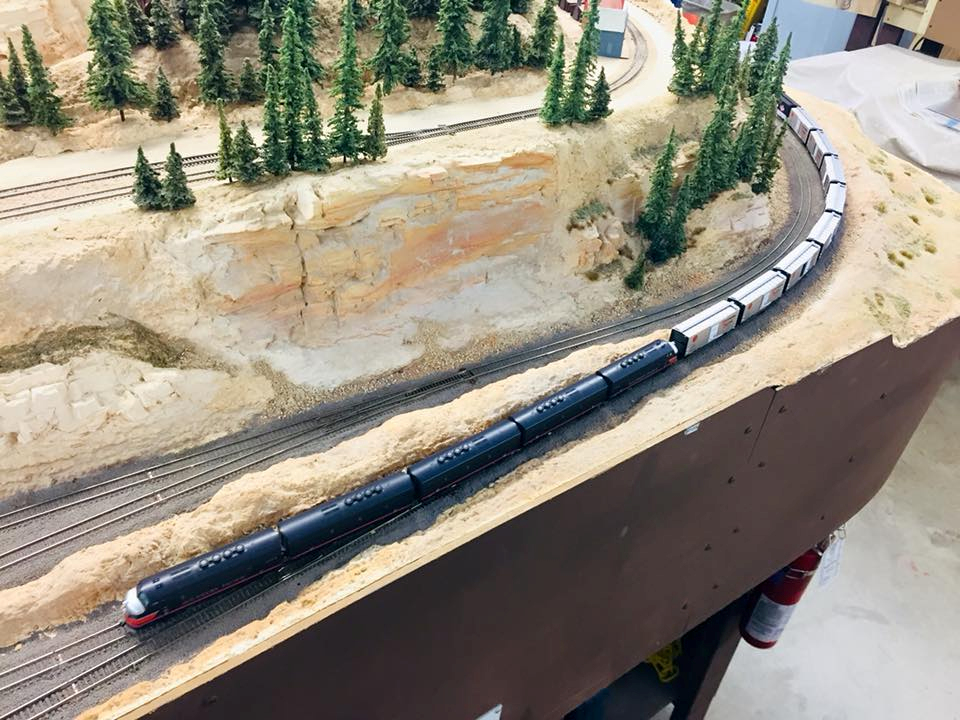 Welcome to the Los Angeles N-Scale Association, operators of East Valley Lines Model Railroad club located since 1979 in the Travel Town Museum at Griffith Los Angeles, California. View pitchers of the East Valley Lines N Scale Model Railroad club and see what they have done to their N scale layout. They operate one of the largest N-Scale layouts in the world. This is just a brief trip on the East Valley Lines' trackage. As you observe closely, there are lots of details to enjoy. This is truly a labor of love, involving countless hours, money and the talents of the many N-Scale modelers dedicated to the memory of great railroads. Brought to you to by www.krafttrains.com