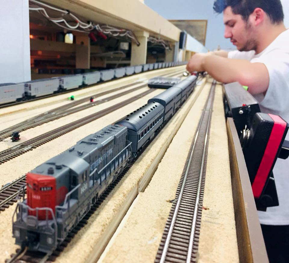 Welcome to the Los Angeles N-Scale Association, operators of East Valley Lines Model Railroad club located since 1979 in the Travel Town Museum at Griffith Los Angeles, California. View pitchers of the East Valley Lines N Scale Model Railroad club and see what they have done to their N scale layout. They operate one of the largest N-Scale layouts in the world. This is just a brief trip on the East Valley Lines' trackage. As you observe closely, there are lots of details to enjoy. This is truly a labor of love, involving countless hours, money and the talents of the many N-Scale modelers dedicated to the memory of great railroads. Brought to you to by www.krafttrains.com