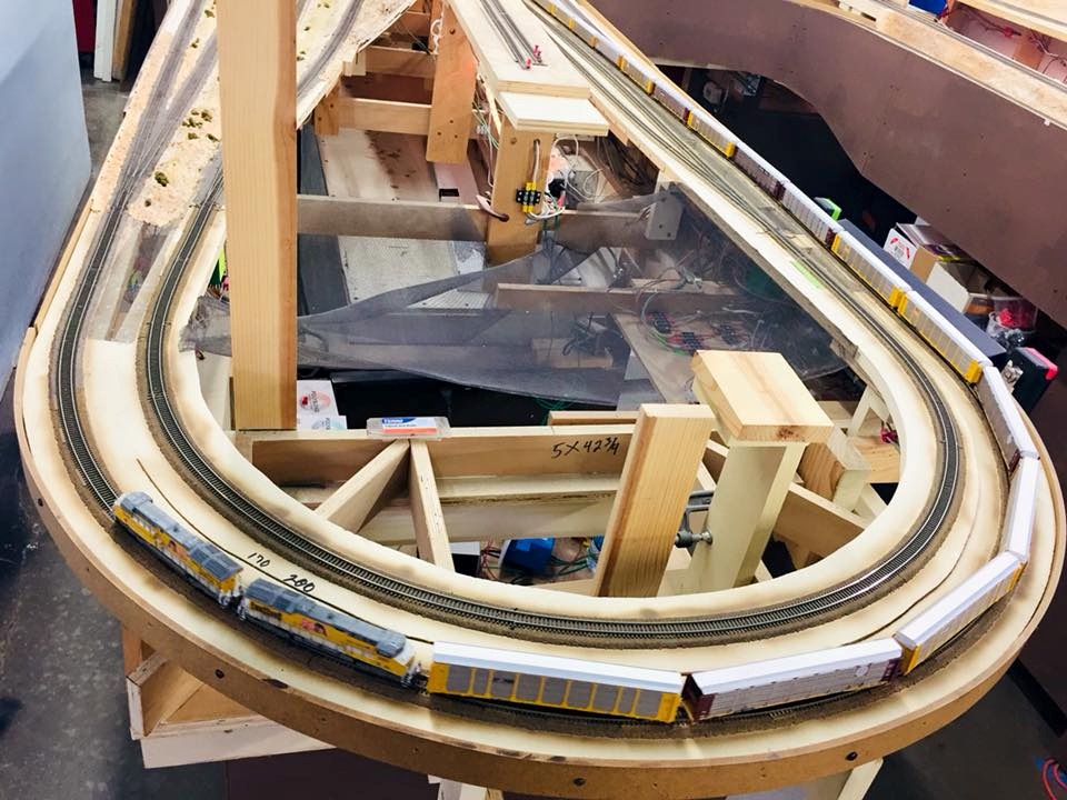 Welcome to the Los Angeles N-Scale Association, operators of East Valley Lines Model Railroad club located since 1979 in the Travel Town Museum at Griffith Los Angeles, California. View pitchers of the East Valley Lines N Scale Model Railroad club and see what they have done to their N scale layout. They operate one of the largest N-Scale layouts in the world. This is just a brief trip on the East Valley Lines' trackage. As you observe closely, there are lots of details to enjoy. This is truly a labor of love, involving countless hours, money and the talents of the many N-Scale modelers dedicated to the memory of great railroads. Brought to you to by www.krafttrains.com