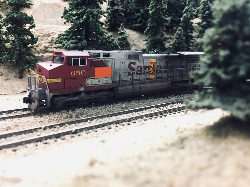 Welcome to the Los Angeles N-Scale Association, operators of East Valley Lines Model Railroad club located since 1979 in the Travel Town Museum at Griffith Los Angeles, California. View pitchers of the East Valley Lines N Scale Model Railroad club and see what they have done to their N scale layout. They operate one of the largest N-Scale layouts in the world. This is just a brief trip on the East Valley Lines' trackage. As you observe closely, there are lots of details to enjoy. This is truly a labor of love, involving countless hours, money and the talents of the many N-Scale modelers dedicated to the memory of great railroads. Brought to you to by www.krafttrains.com