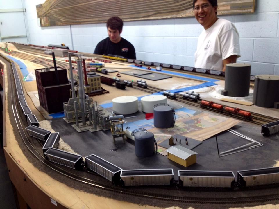 Welcome to the Los Angeles N-Scale Association, operators of East Valley Lines Model Railroad club located since 1979 in the Travel Town Museum at Griffith Los Angeles, California. View pitchers of the East Valley Lines N Scale Model Railroad club and see what they have done to their N scale layout. They operate one of the largest N-Scale layouts in the world. This is just a brief trip on the East Valley Lines' trackage. As you observe closely, there are lots of details to enjoy. This is truly a labor of love, involving countless hours, money and the talents of the many N-Scale modelers dedicated to the memory of great railroads. Brought to you to by www.krafttrains.com