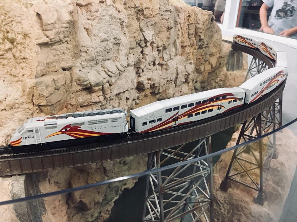 Welcome to the Los Angeles N-Scale Association, operators of East Valley Lines Model Railroad club located since 1979 in the Travel Town Museum at Griffith Los Angeles, California. View pitchers of the East Valley Lines N Scale Model Railroad club and see what they have done to their N scale layout. They operate one of the largest N-Scale layouts in the world. This is just a brief trip on the East Valley Lines' trackage. As you observe closely, there are lots of details to enjoy. This is truly a labor of love, involving countless hours, money and the talents of the many N-Scale modelers dedicated to the memory of great railroads. Brought to you to by www.krafttrains.com