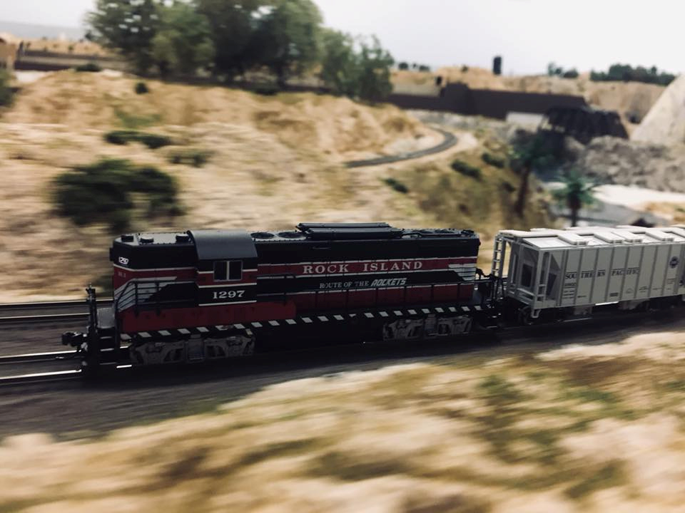 Welcome to the Los Angeles N-Scale Association, operators of East Valley Lines Model Railroad club located since 1979 in the Travel Town Museum at Griffith Los Angeles, California. View pitchers of the East Valley Lines N Scale Model Railroad club and see what they have done to their N scale layout. They operate one of the largest N-Scale layouts in the world. This is just a brief trip on the East Valley Lines' trackage. As you observe closely, there are lots of details to enjoy. This is truly a labor of love, involving countless hours, money and the talents of the many N-Scale modelers dedicated to the memory of great railroads. Brought to you to by www.krafttrains.com