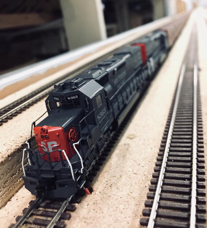 Welcome to the Los Angeles N-Scale Association, operators of East Valley Lines Model Railroad club located since 1979 in the Travel Town Museum at Griffith Los Angeles, California. View pitchers of the East Valley Lines N Scale Model Railroad club and see what they have done to their N scale layout. They operate one of the largest N-Scale layouts in the world. This is just a brief trip on the East Valley Lines' trackage. As you observe closely, there are lots of details to enjoy. This is truly a labor of love, involving countless hours, money and the talents of the many N-Scale modelers dedicated to the memory of great railroads. Brought to you to by www.krafttrains.com