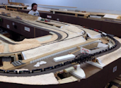 Welcome to the Los Angeles N-Scale Association, operators of East Valley Lines Model Railroad located since 1979 in the Travel Town Museum at Griffith Park. View pitchers of the East Valley Lines N Scale Model Railroad and see what they have done to their N scale layout. They operate one of the largest N-Scale layouts in the world. This is just a brief trip on the East Valley Lines' trackage. As you observe closely, there are lots of details to enjoy. This is truly a labor of love, involving countless hours, money and the talents of the many N-Scale modelers dedicated to the memory of great railroads. Brought to you to by www.krafttrains.com