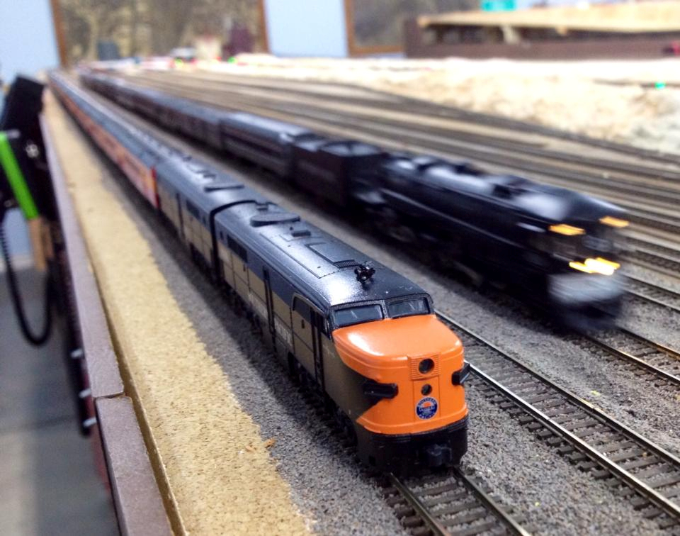 Welcome to the Los Angeles N-Scale Association, operators of East Valley Lines Model Railroad club located since 1979 in the Travel Town Museum at Griffith Los Angeles, California. View pitchers of the East Valley Lines N Scale Model Railroad club and see what they have done to their N scale layout. They operate one of the largest N-Scale layouts in the world. This is just a brief trip on the East Valley Lines' trackage. As you observe closely, there are lots of details to enjoy. This is truly a labor of love, involving countless hours, money and the talents of the many N-Scale modelers dedicated to the memory of great railroads. Brought to you to by www.krafttrains.com