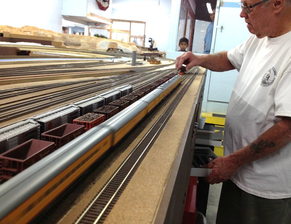 Welcome to the Los Angeles N-Scale Association, operators of East Valley Lines Model Railroad club located since 1979 in the Travel Town Museum at Griffith Los Angeles, California. View pitchers of the East Valley Lines N Scale Model Railroad club and see what they have done to their N scale layout. They operate one of the largest N-Scale layouts in the world. This is just a brief trip on the East Valley Lines' trackage. As you observe closely, there are lots of details to enjoy. This is truly a labor of love, involving countless hours, money and the talents of the many N-Scale modelers dedicated to the memory of great railroads. Brought to you to by www.krafttrains.com