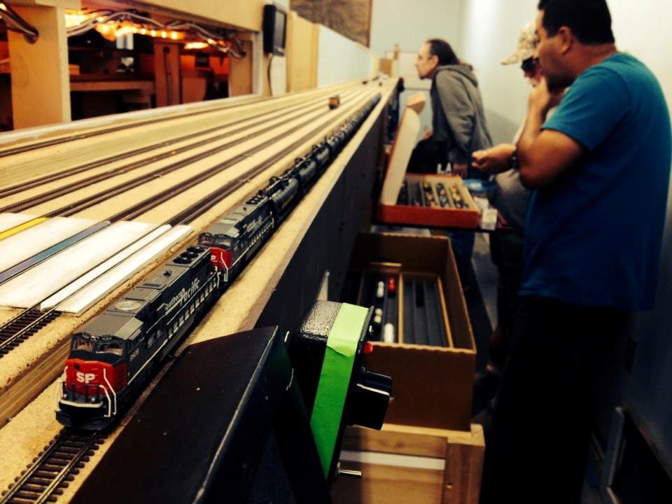 Welcome to the Los Angeles N-Scale Association, operators of East Valley Lines Model Railroad club located since 1979 in the Travel Town Museum at Griffith Los Angeles, California. View pitchers of the East Valley Lines N Scale Model Railroad club and see what they have done to their N scale layout. They operate one of the largest N-Scale layouts in the world. This is just a brief trip on the East Valley Lines' trackage. As you observe closely, there are lots of details to enjoy. This is truly a labor of love, involving countless hours, money and the talents of the many N-Scale modelers dedicated to the memory of great railroads. Brought to you to by www.krafttrains.com