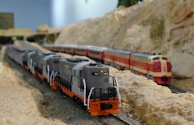 Welcome to the Los Angeles N-Scale Association, operators of East Valley Lines Model Railroad located since 1979 in the Travel Town Museum at Griffith Park. View pitchers of the East Valley Lines N Scale Model Railroad and see what they have done to their N scale layout. They operate one of the largest N-Scale layouts in the world. This is just a brief trip on the East Valley Lines' trackage. As you observe closely, there are lots of details to enjoy. This is truly a labor of love, involving countless hours, money and the talents of the many N-Scale modelers dedicated to the memory of great railroads. Brought to you to by www.krafttrains.com