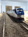 Welcome to the Los Angeles N-Scale Association, operators of East Valley Lines Model Railroad located since 1979 in the Travel Town Museum at Griffith Park. View pitchers of the East Valley Lines N Scale Model Railroad and see what they have done to their N scale layout. They operate one of the largest N-Scale layouts in the world. This is just a brief trip on the East Valley Lines' trackage. As you observe closely, there are lots of details to enjoy. This is truly a labor of love, involving countless hours, money and the talents of the many N-Scale modelers dedicated to the memory of great railroads. Brought to you to by www.krafttrains.com