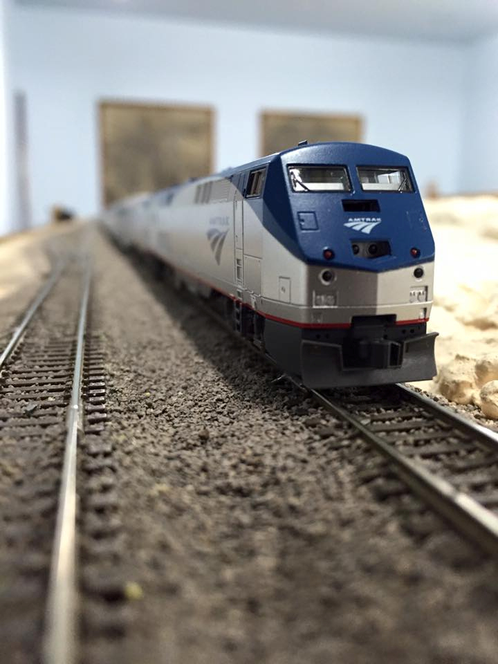 Welcome to the Los Angeles N-Scale Association, operators of East Valley Lines Model Railroad club located since 1979 in the Travel Town Museum at Griffith Los Angeles, California. View pitchers of the East Valley Lines N Scale Model Railroad club and see what they have done to their N scale layout. They operate one of the largest N-Scale layouts in the world. This is just a brief trip on the East Valley Lines' trackage. As you observe closely, there are lots of details to enjoy. This is truly a labor of love, involving countless hours, money and the talents of the many N-Scale modelers dedicated to the memory of great railroads. Brought to you to by www.krafttrains.com