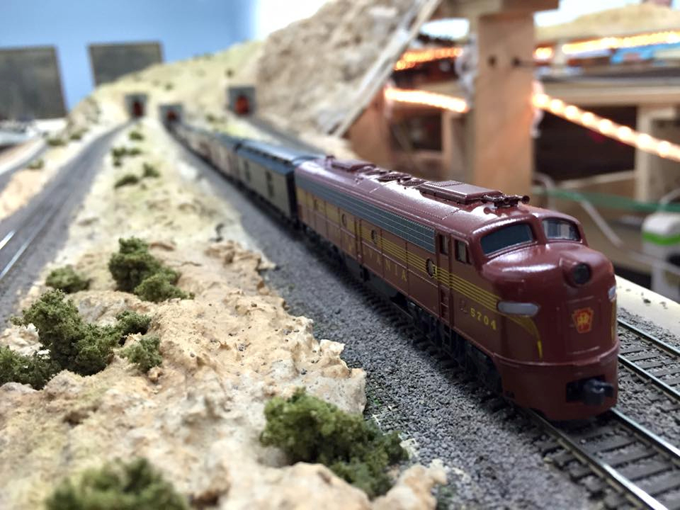 Welcome to the Los Angeles N-Scale Association, operators of East Valley Lines Model Railroad club located since 1979 in the Travel Town Museum at Griffith Los Angeles, California. View pitchers of the East Valley Lines N Scale Model Railroad club and see what they have done to their N scale layout. They operate one of the largest N-Scale layouts in the world. This is just a brief trip on the East Valley Lines' trackage. As you observe closely, there are lots of details to enjoy. This is truly a labor of love, involving countless hours, money and the talents of the many N-Scale modelers dedicated to the memory of great railroads. Brought to you to by www.krafttrains.com