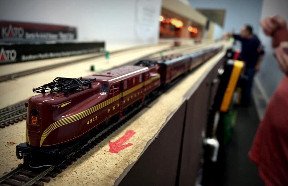 Welcome to the Los Angeles N-Scale Association, operators of East Valley Lines Model Railroad club located since 1979 in the Travel Town Museum at Griffith Los Angeles, California. View pitchers of the East Valley Lines N Scale Model Railroad club and see what they have done to their N scale layout. They operate one of the largest N-Scale layouts in the world. This is just a brief trip on the East Valley Lines' trackage. As you observe closely, there are lots of details to enjoy. This is truly a labor of love, involving countless hours, money and the talents of the many N-Scale modelers dedicated to the memory of great railroads. Brought to you to by www.krafttrains.com