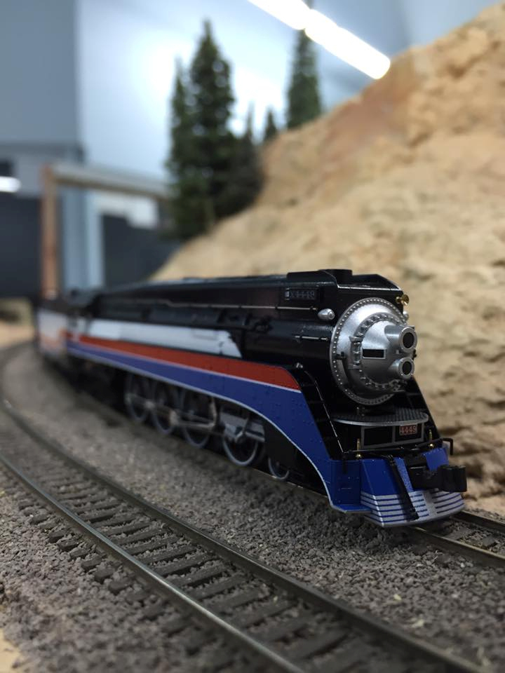 Welcome to the Los Angeles N-Scale Association, operators of East Valley Lines Model Railroad club located since 1979 in the Travel Town Museum at Griffith Los Angeles, California. View pitchers of the East Valley Lines N Scale Model Railroad club and see what they have done to their N scale layout. They operate one of the largest N-Scale layouts in the world. This is just a brief trip on the East Valley Lines' trackage. As you observe closely, there are lots of details to enjoy. This is truly a labor of love, involving countless hours, money and the talents of the many N-Scale modelers dedicated to the memory of great railroads. Brought to you to by www.krafttrains.com